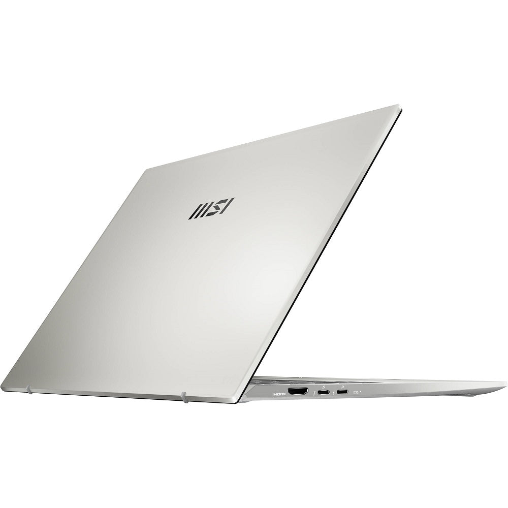 MSI Prestige 14 Evo laptop in silver with a 14-inch FHD display; side shows HDMI port.