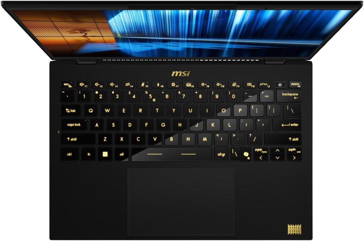 MSI Prestige 13 AI Plus Ukioyo Edition laptop with black chassis, gold backlit keyboard, 13.3-inch OLED